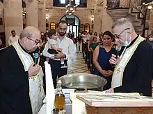 A baptism at St. Paul's Church.