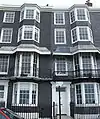 Two styles of black mathematical tiles on Royal Crescent, Brighton