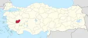 Uşak highlighted in red on a beige political map of Turkeym