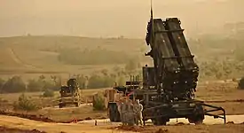 U.S. service members stand by a Patriot Missile Battery in Gaziantep, Turkey