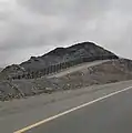 Border barrier between UAE and Oman as seen from the Emirati side.