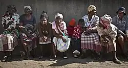 Tengan women waiting to see medical personnel.