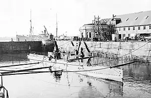 Portsmouth Naval Shipyard with L-8 in 1917, the first submarine built by an US Navy shipyard