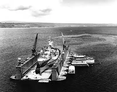 AFDB-1 with USS West Virginia in for repairs off Aessi Island on 13 November 1944