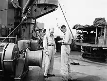 On the deck while anchored at Holandia, New Guinea (now [Jayapura, Indonesia]).