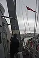 A courtesy Turkish flag is raised aboard the destroyer USS Truxtun  as the ship transits the Bosphorus strait