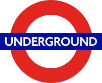 London Underground logo, known as the roundel, is made of a red circle with a horizontal blue bar.