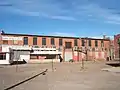 Empty warehouse that used to stand just west of Jack Kerouac Lofts. Later demolished for X Denver