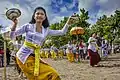 Balinese women wearing kebaya in Melasti ritual ceremony, a self-purification ceremony to welcome Nyepi by all Hindus in Bali.