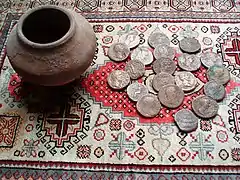 Pot and selection of coins from the Upchurch Hoard