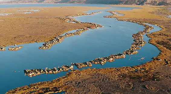 The constellation of the Uros Floating Islands as seen from the air, about 5km off the coast of Puno.