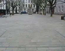 During the German occupation of Jersey, a stonemason repairing the paving of the Royal Square incorporated a V for victory under the noses of the occupiers. This was later amended to refer to the Red Cross ship Vega. The addition of the date 1945 and a more recent frame has transformed it into a monument.