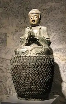 Copper alloy statue of Vairocana, made in China during the Ming dynasty (1368–1644). Displayed at the Cantor Center for Visual Arts.