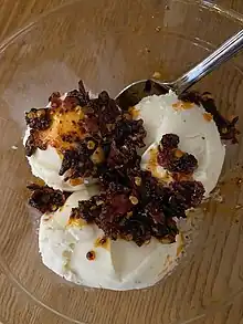 ice cream with crunchy, oil hot sauce on top