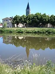 The Arroux river and church in Vendenesse-sur-Arroux