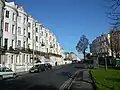 The northern end of Vernon Terrace, looking towards Seven Dials (the tree is close to the junction itself).  The start of Montpelier Crescent is on the right.