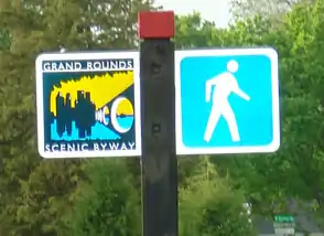 A pedestrian sign on Victory Memorial Drive