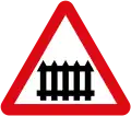 11a) — Level crossing with gates ahead