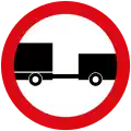 No entry for any power driven vehicle drawing a trailer, except semi-trailers or single axle trailers