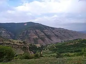 Photo of the nearby mountain range, captured atop hills near Ostayir village