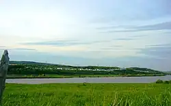 A view of the village from across Petit-Lac-Saint-Mathieu