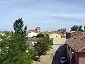 A view of Valdunquillo, with the Palace of the Dukes of Alba in the background (the Pink building)