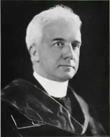 Photograph of W. Coleman Nevils in academic regalia