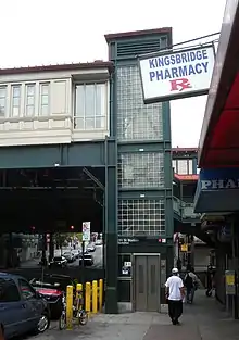 An elevator on the sidewalk outside the 231st Street station, leading up to the platform