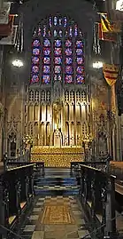 Altar and reredos (1916).