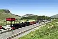 A train with NG143 heading for Beddgelert, May 2009