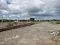 Northern end of the Waingawa railway station yard, bordering Norfolk Road.