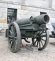 28 cm barrel and recoil assembly on its transport cart in front of the Museum of the Polish Army in Warsaw