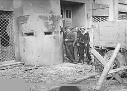 Resistance fighters from "Chrobry I" Battalion in front of German police station "Nordwache" at the junction of Chłodna and Żelazna Streets, 3 August 1944; only one rebel has a weapon