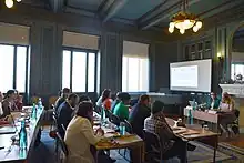 Participants at desks at water diplomacy training in Swedish Institute Alexandria