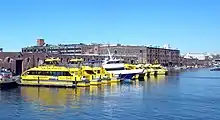 Boats moored at New York Water Taxi's storage facility in Red Hook, Brooklyn near New York Water Taxi's former ferry slip behind the Fairway Market