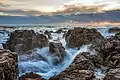 Image 4Waves on rocks at sunset in Sète, France