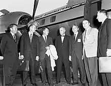 From left to right are Elliot See, Tom Stafford, Wally Schirra, John Glenn, Brainerd Holmes, Wernher von Braun, and Jim Lovell in 1962.