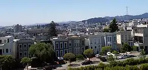 A southern view from Alta Plaza Park, which is in the Pacific Heights neighborhood. Most of the valley in the central part of this image is in the Western Addition neighborhood.