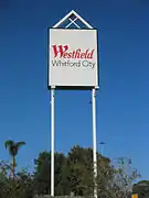 The sign of Westfield Whitford City.