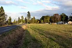 Whiteson Road and field in Whiteson