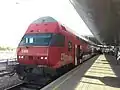 An ÖBB double deck cab car at Wien Praterstern