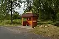 Bus stop with bus stop shelter