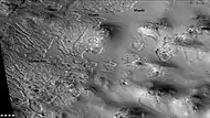 Channels and mantle, as seen by CTX camera (on Mars Reconnaissance Orbiter). Channels are exposed where the mantle has disappeared.