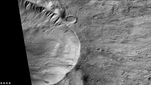 Gullies in crater on the rim of Slipher Crater, as seen by CTX camera (on Mars Reconnaissance Orbiter).  Note: this is an enlargement of the previous image of Slipher Crater.