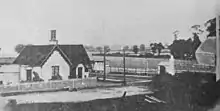 Willesden railway station (opened July 1842) and Acton Lane level crossing