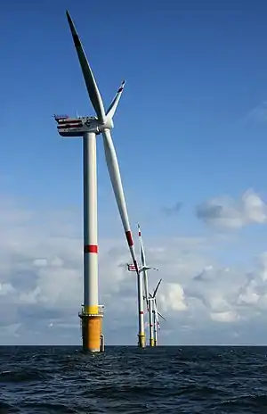 Image 8Thorntonbank Wind FarmPhoto credit: Hans HillewaertWind turbines belonging to the Thorntonbank Wind Farm located in the North Sea, 28 km (17 mi) off the coast of Belgium. Electricity generation started in early 2009, with an initial capacity of 30 MW, and that number is expected to rise to 300 MW by 2015. A 37 km (23 mi) 150 kV undersea cable connects the wind farm to the shore.More selected pictures