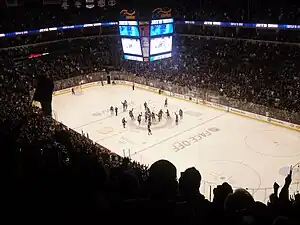 An interior view of the ice rink and stands at BellMTS Centre as the fans and players celebrate the team's first home victory