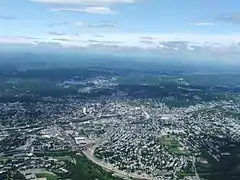 Worcester and the surrounding areas in 2006, looking north from 3,700 feet (1,100 m). Route 146 can be seen under construction.