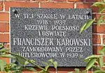 Memorial plaque to the interwar Polish school principal Franciszek Karowski, murdered by the Germans in 1939, at the old school building