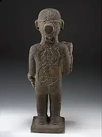 Back side statue of Xipe Totec found in Tepepan